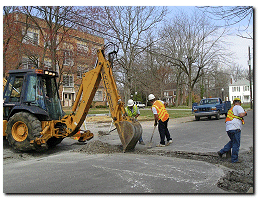 Folks repairing a street