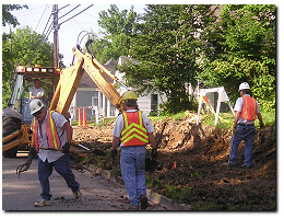 Folks repairing a street